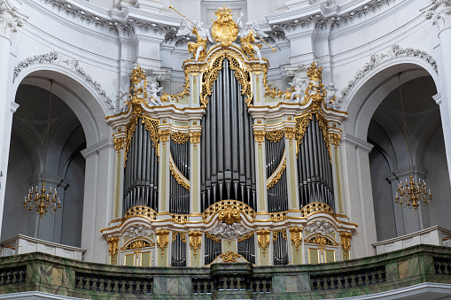 Pipe organ inside the restored Dresden Cathedral (Katholische Hofkirche), a famous landmark in the historic center of Dresden, the capital of Saxony in Germany. The church was severely damaged during the bombing of Dresden in World War II.