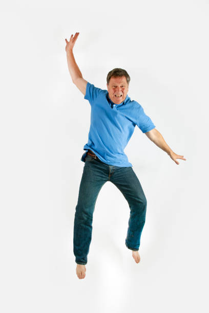 istock man jumps in the air 1075723836