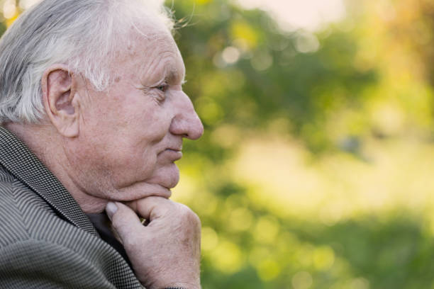 istock portrait of  elderly man in  park 1075733442