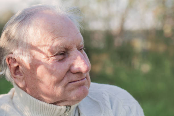 istock portrait of  elderly man in  park 1075733448