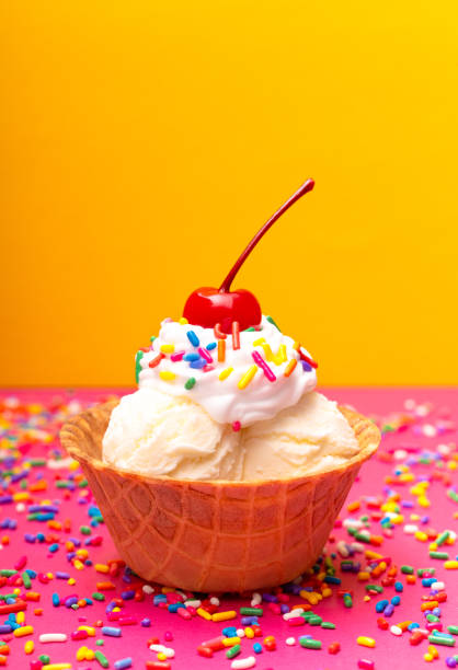 istock Vanilla Ice Cream in a Waffle Cone Bowl wiht a Cherry on Top 1075752286