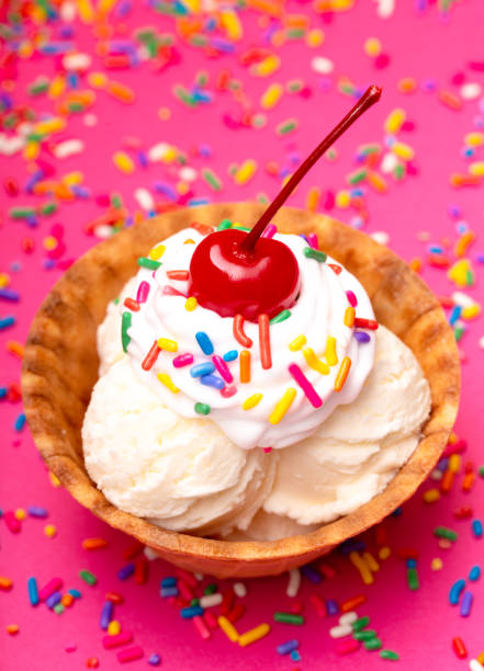 istock Vanilla Ice Cream in a Waffle Cone Bowl wiht a Cherry on Top 1075752290