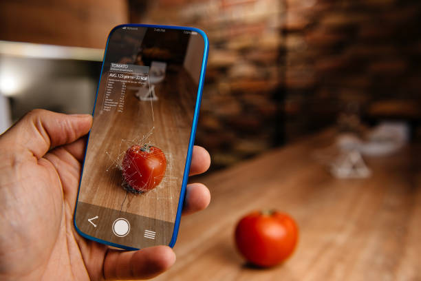 Augmented reality application using artificial intelligence for recognizing food Men using artificial intelligence on smart phone with augmented reality application for recognizing food augmented reality app stock pictures, royalty-free photos & images