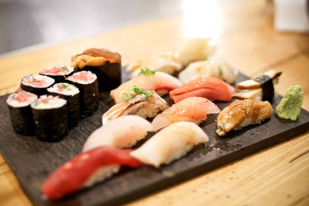 istock Selective focus on Sushi platter with assorted maki and freshly made sushi 1075764134