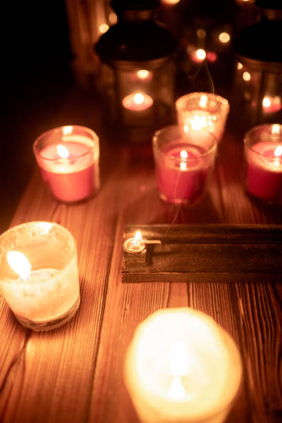 istock Mix candles, lanterns and incense on rustic wood 1075784140
