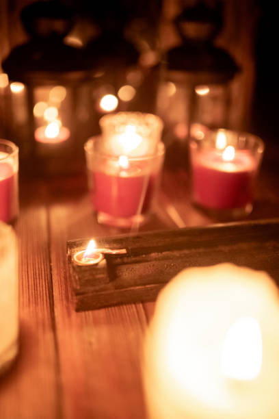 istock Mix candles, lanterns and incense on rustic wood 1075789222