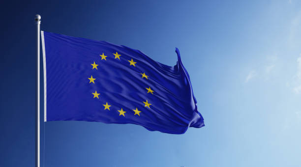 istock European Union Flag Waving With Wind On Blue Sky 1075790476
