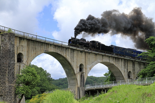 Miyamori bridge and steam locomotive in Tono, Iwate, Japan