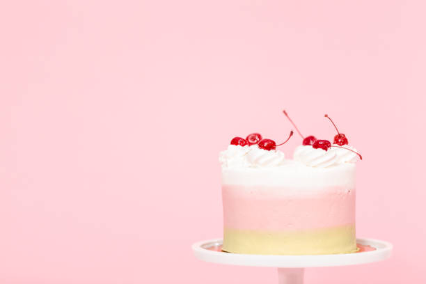 istock Birthday Spumoni cake on pink background. 1075794814