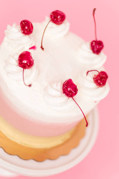 istock Birthday Spumoni cake on pink background. 1075794872
