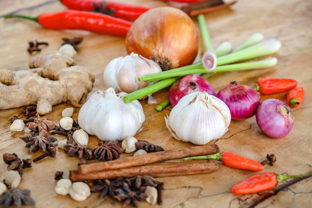 Close up variation of fresh ingredients to cook, above a wooden table