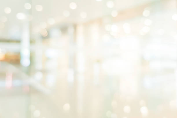 istock abstract blurred beautiful interior of lobby reception condominium background with bokeh light from lamp ,for presentation , banner design 1075802384
