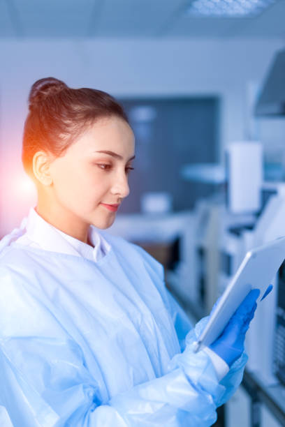 istock Young female scientist working in the laboratory 1075803714
