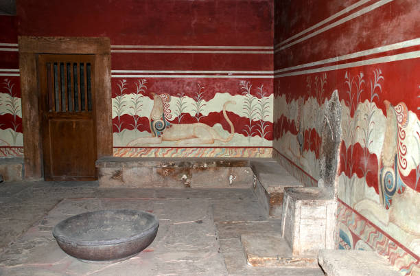 Knossos Throne Room The Minoan alabaster throne is surrounded by beautiful murals in Knossos, Crete, Greece. knossos photos stock pictures, royalty-free photos & images