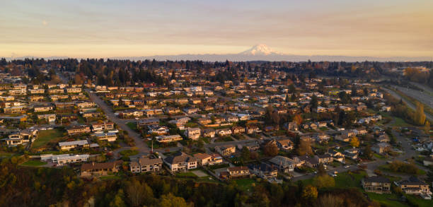 North Tacoma Residential Homes on Hillside Mount Rainier Golden light hits the homes here on clear afternoons at sunset in Tacoma tacoma stock pictures, royalty-free photos & images