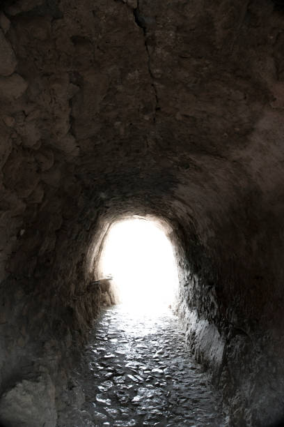istock Light at end of tunnel 1075857012