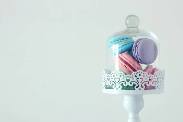 istock Image of colorful macaron or macaroon over pastel background. 1075862192