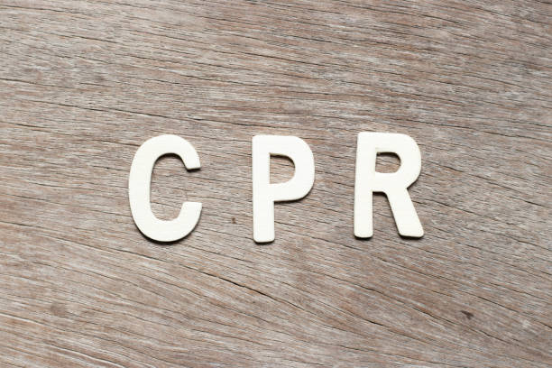 istock Alphabet letter in word CPR (abbreviation of Cardiopulmonary resuscitation) on wood background 1075868274