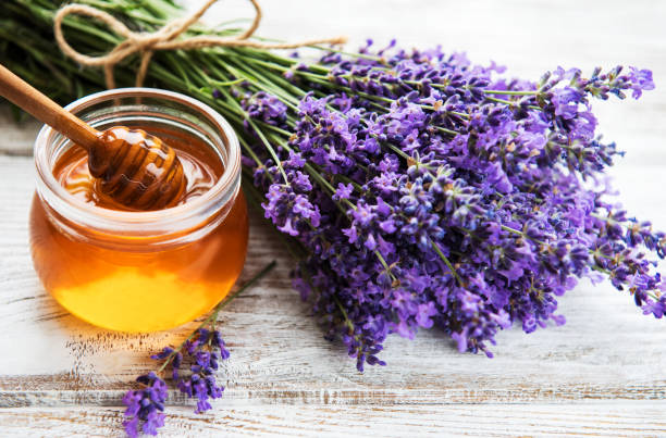 istock Jar with honey and fresh lavender 1075888218