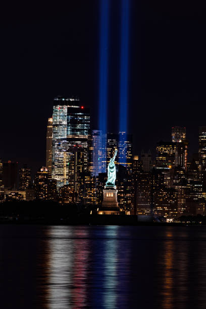 istock 9/11 Memorial Beacons with Statue of Liberty Lower Manhattan 1075898014