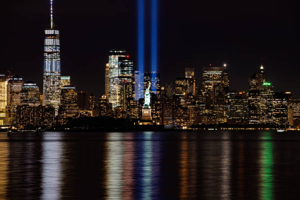 istock 9/11 Memorial Beacons with Statue of Liberty Lower Manhattan 1075898016
