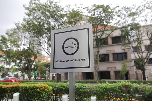 Designated smoking area sign in Singapore.