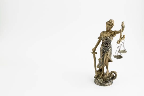 istock Law symbol; statue of justice on white background 1075905318