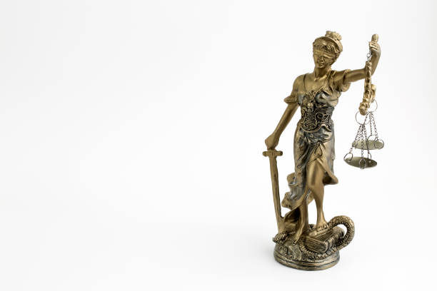 istock Law symbol; statue of justice on white background 1075905900