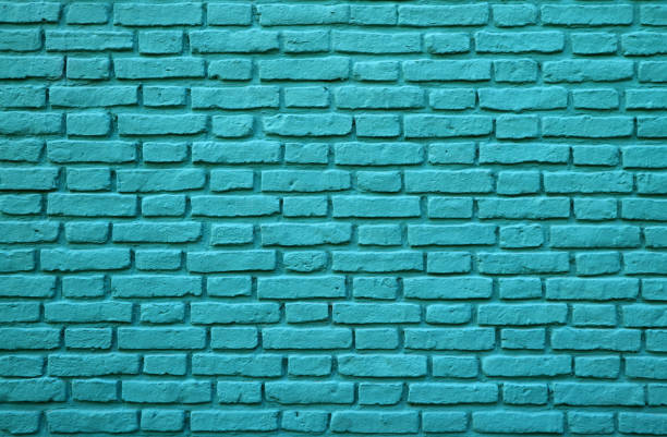 turquoise colored brick wall at la boca in buenos aires of argentina for background, texture or pattern - buenos aires argentina south america la boca imagens e fotografias de stock