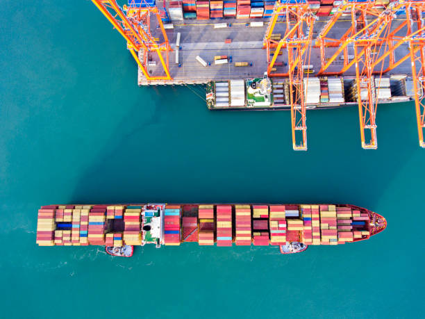 istock Aerial view of cargo ship in transit. 1075927090
