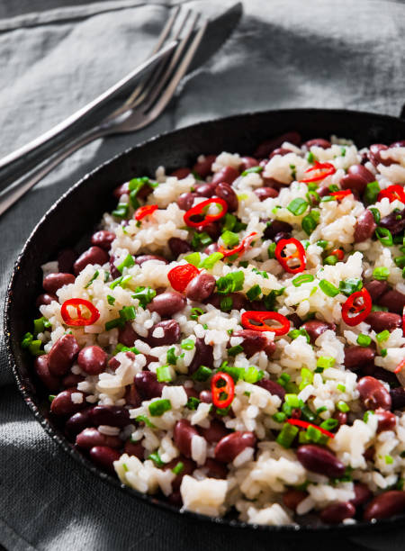 istock rice with red beans and vegetables in a frying pan 1075944292