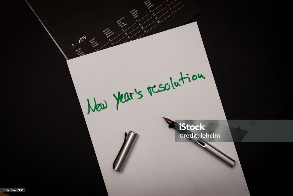 A piece of paper and a calender for all good things for next year A piece of paper, a pen and a calendar, "New Year's resolution" written on the paper 2010 Stock Photo A piece of paper and a calender for all good things for next year A piece of paper, a pen and a calendar, "New Year's resolution" written on the paper 2010 Stock Photo