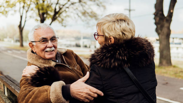 istock Old couple resting in the park 1075959068