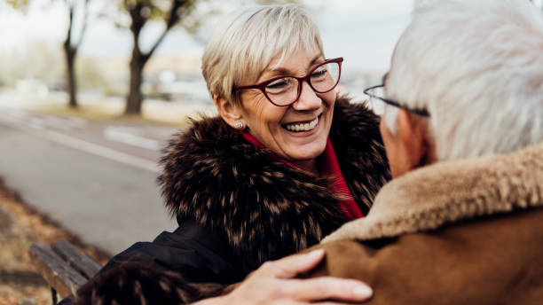 istock Older woman smiling at her husband 1075959110