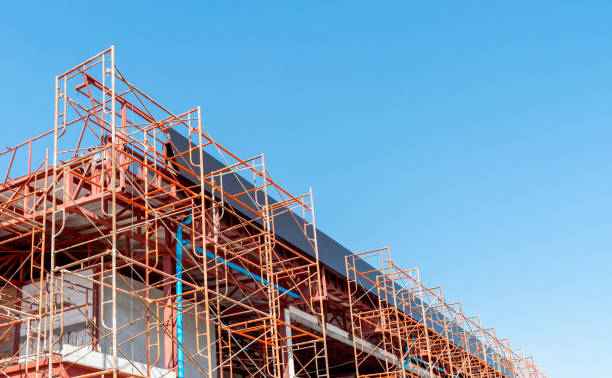 istock building construction site with soft-focus and over light in the background 1075959398