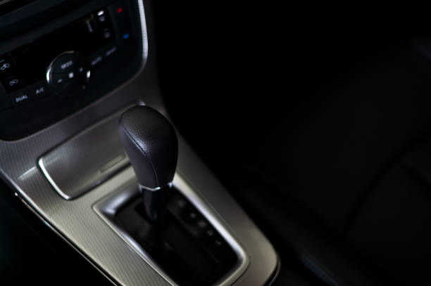 istock closeup automatic gear in new car with soft-focus and over light in the background 1075959400