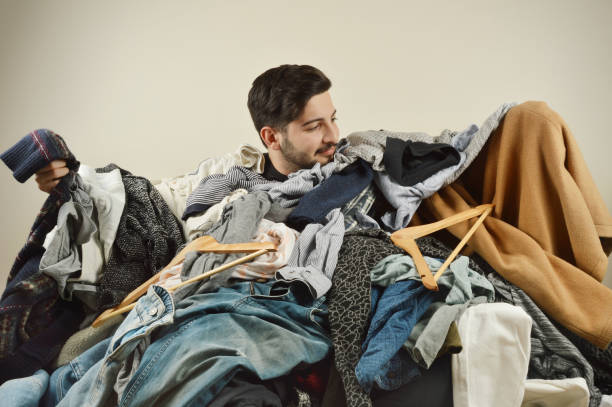 istock Young men cant decide what to wear 1075963772