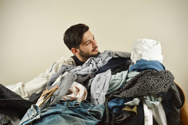 istock Young men cant decide what to wear 1075964336