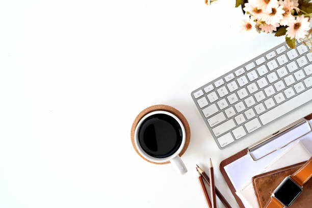 istock Office white wooden workspace office gadget and copy space. 1075965488