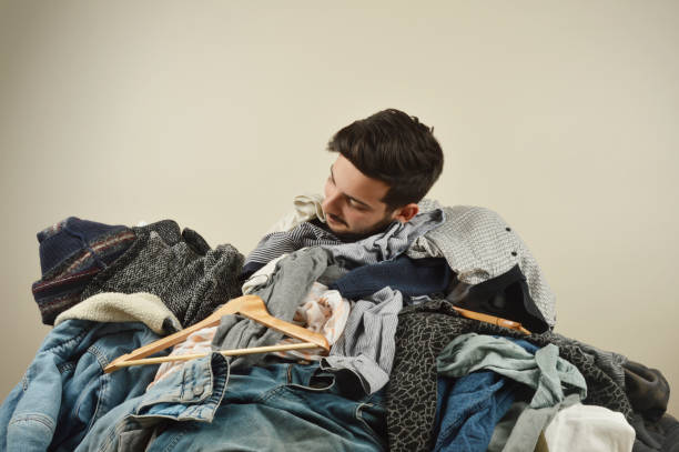 istock Young men cant decide what to wear 1075965768