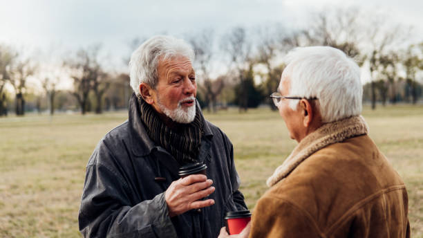 istock Happy old men in the park 1075969960