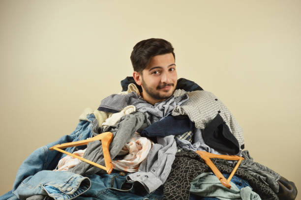 istock Young men cant decide what to wear 1075970270
