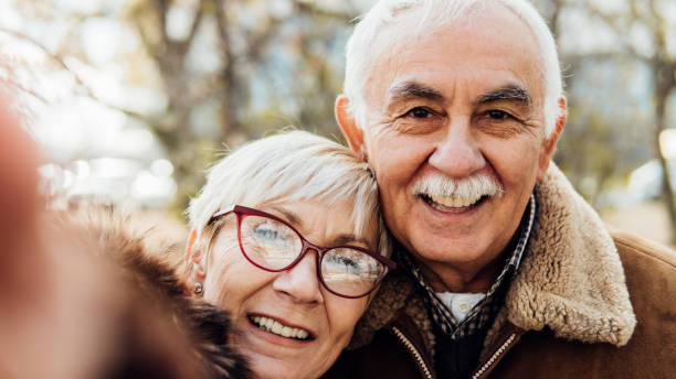istock Happy couple taking a selfie 1075970418
