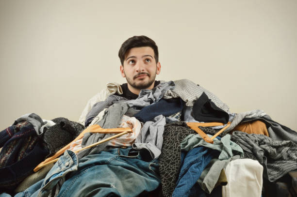 istock Young men cant decide what to wear 1075973518