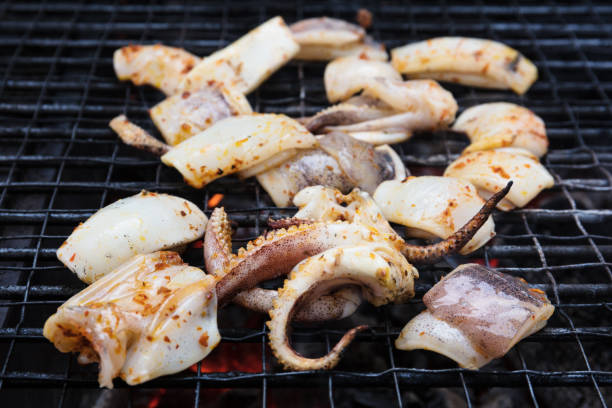 istock octopus is preparing on grill seafood 1075978842