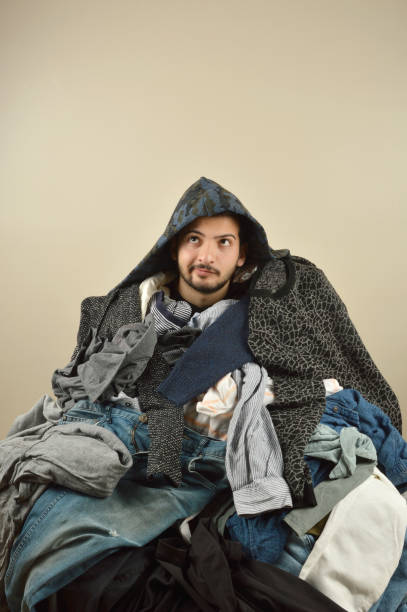 istock Young men cant decide what to wear 1075979064