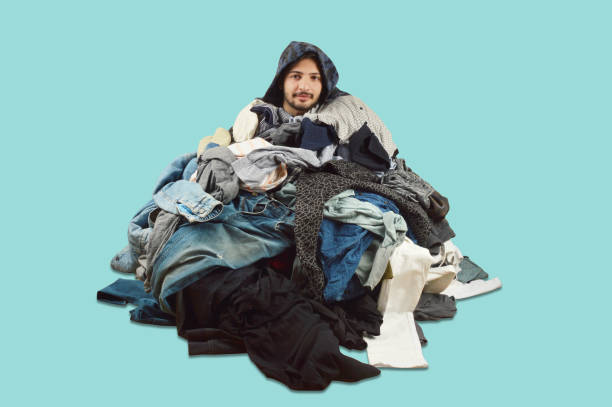 istock Young men cant decide what to wear with (clipping path) 1075980416