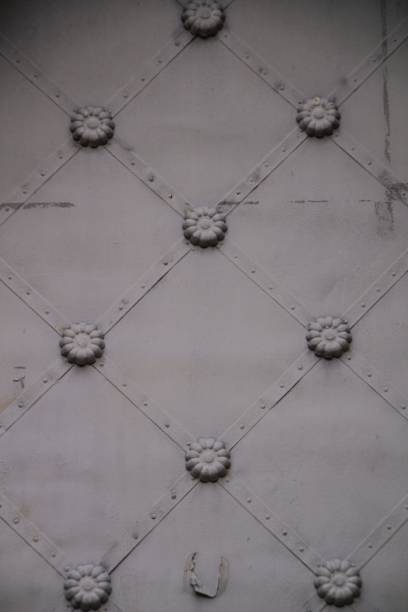 istock Old forged metal door 1075981168