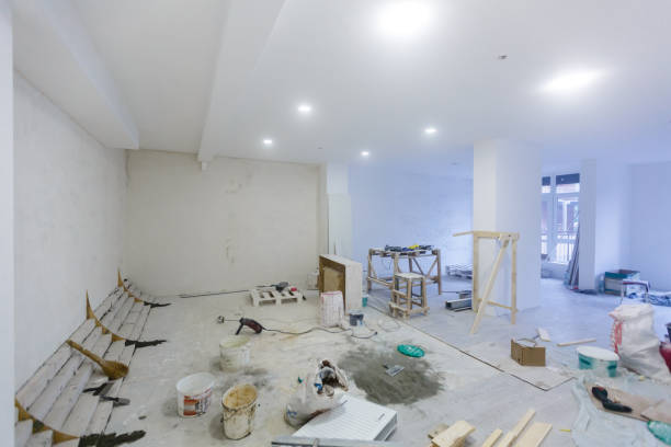 istock Working process of installing metal frames for plasterboard -drywall - for making gypsum walls in apartment is under construction, remodeling, renovation, extension, restoration and reconstruction. 1075981170