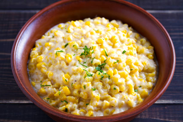 istock Sweet and creamy corn in bowl. Homemade corn dish 1075985328